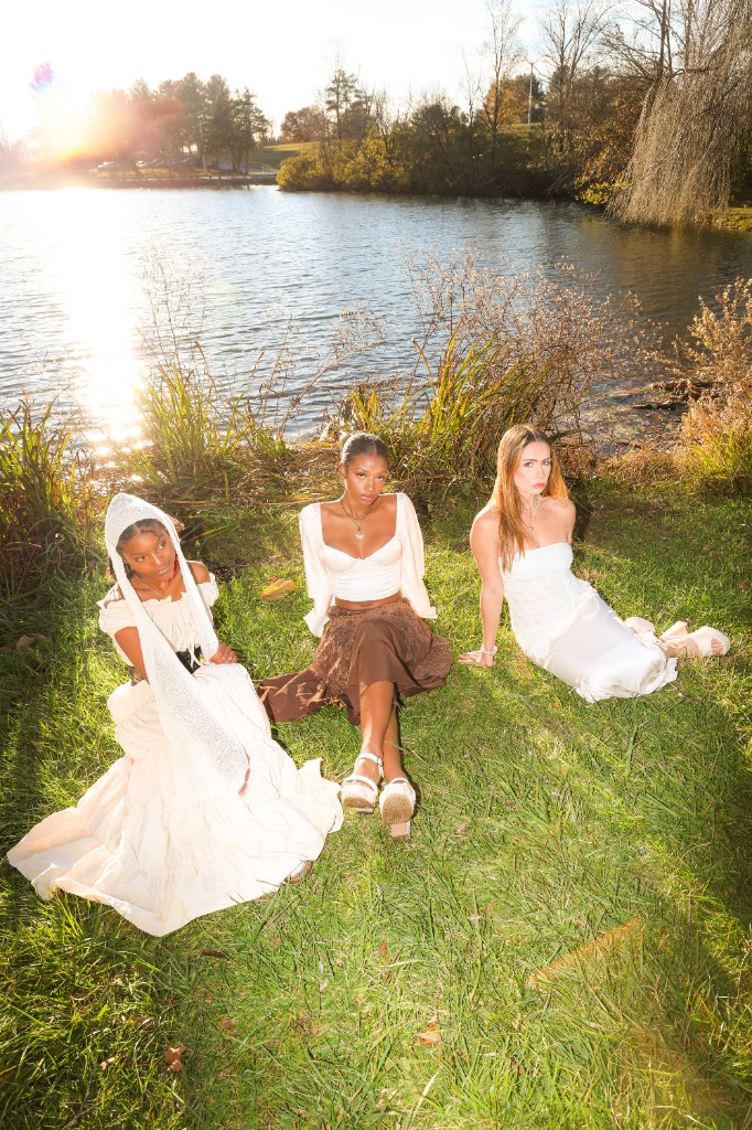 Group portrait by the lake at golden hour