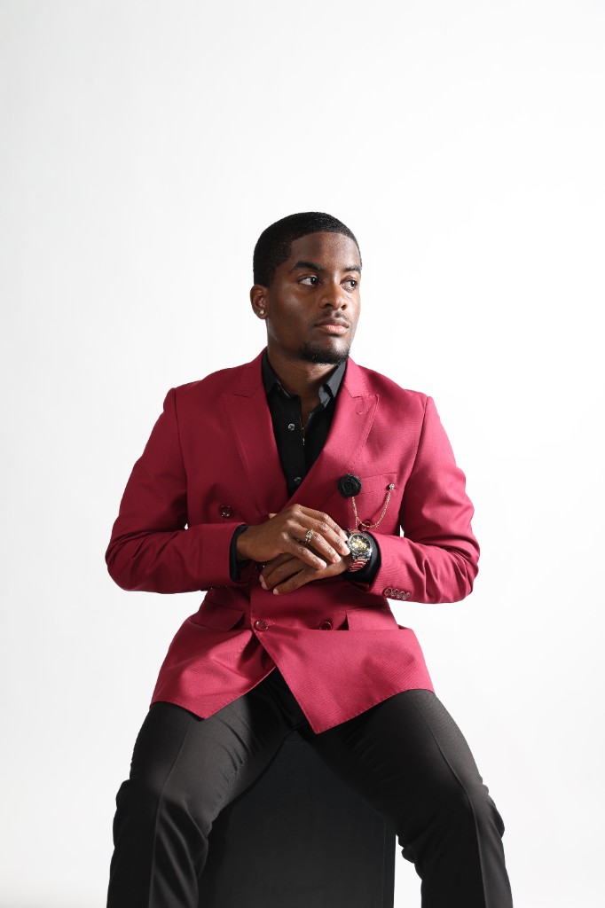 Studio headshot in red blazer